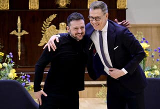 Mr Zelensky and Mr Stubb embrace after discussions about continued support to Ukraine
